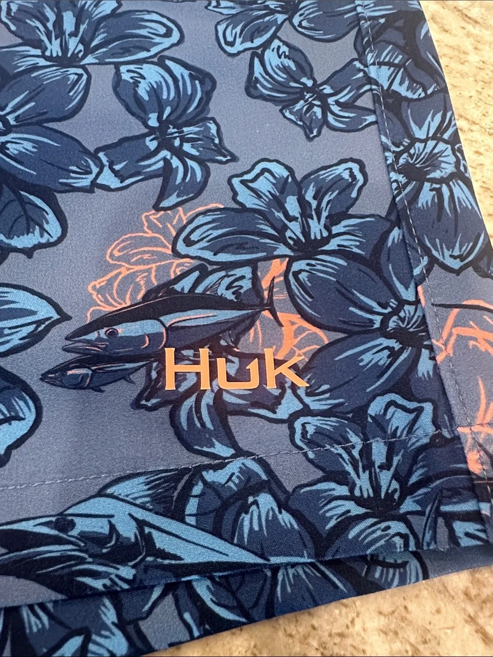 Huk Men’s Blue Floral Swim Trunks with Coral Drawstring